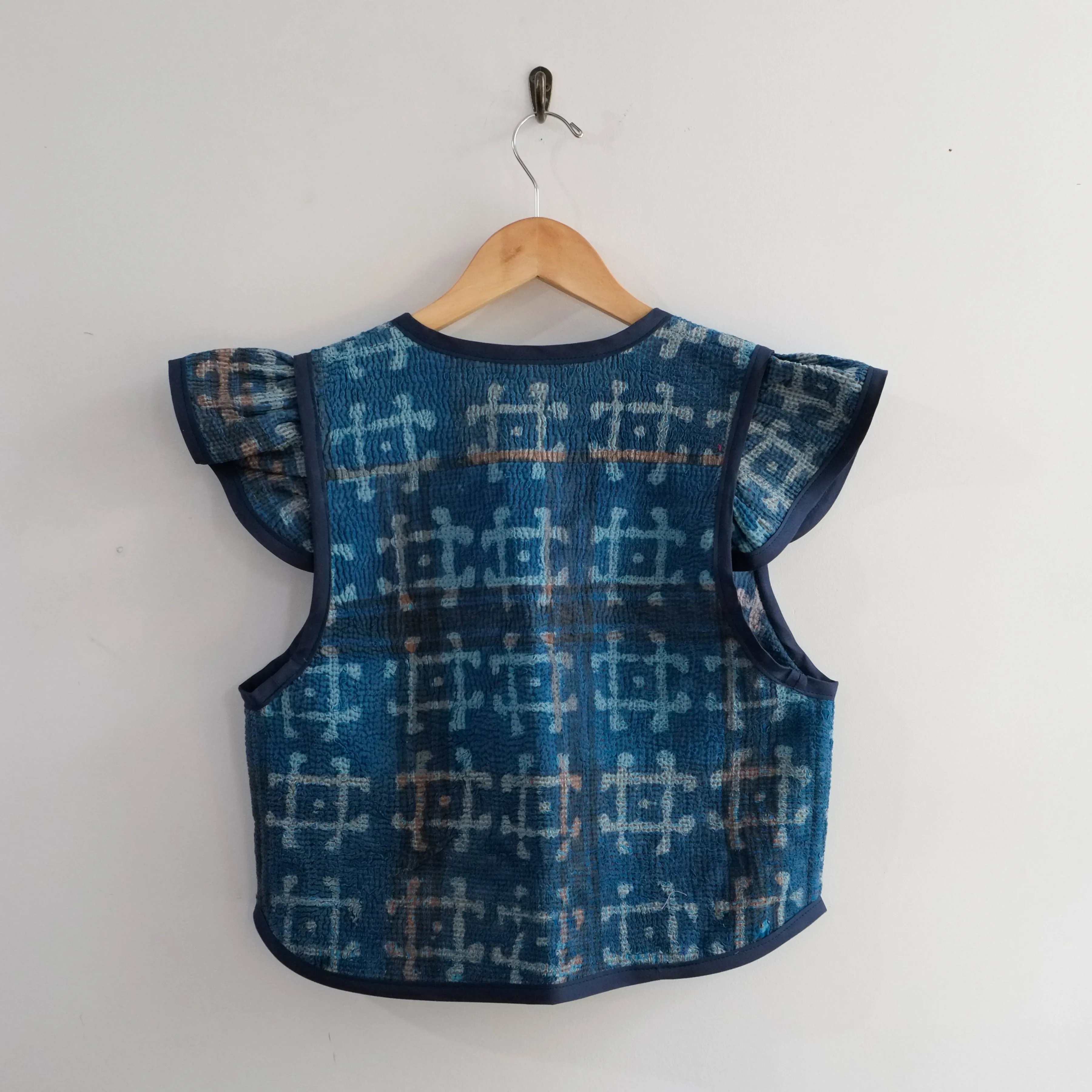 Amelia Flutter Sleeve Vest Indigo with Pound Symbol XS009