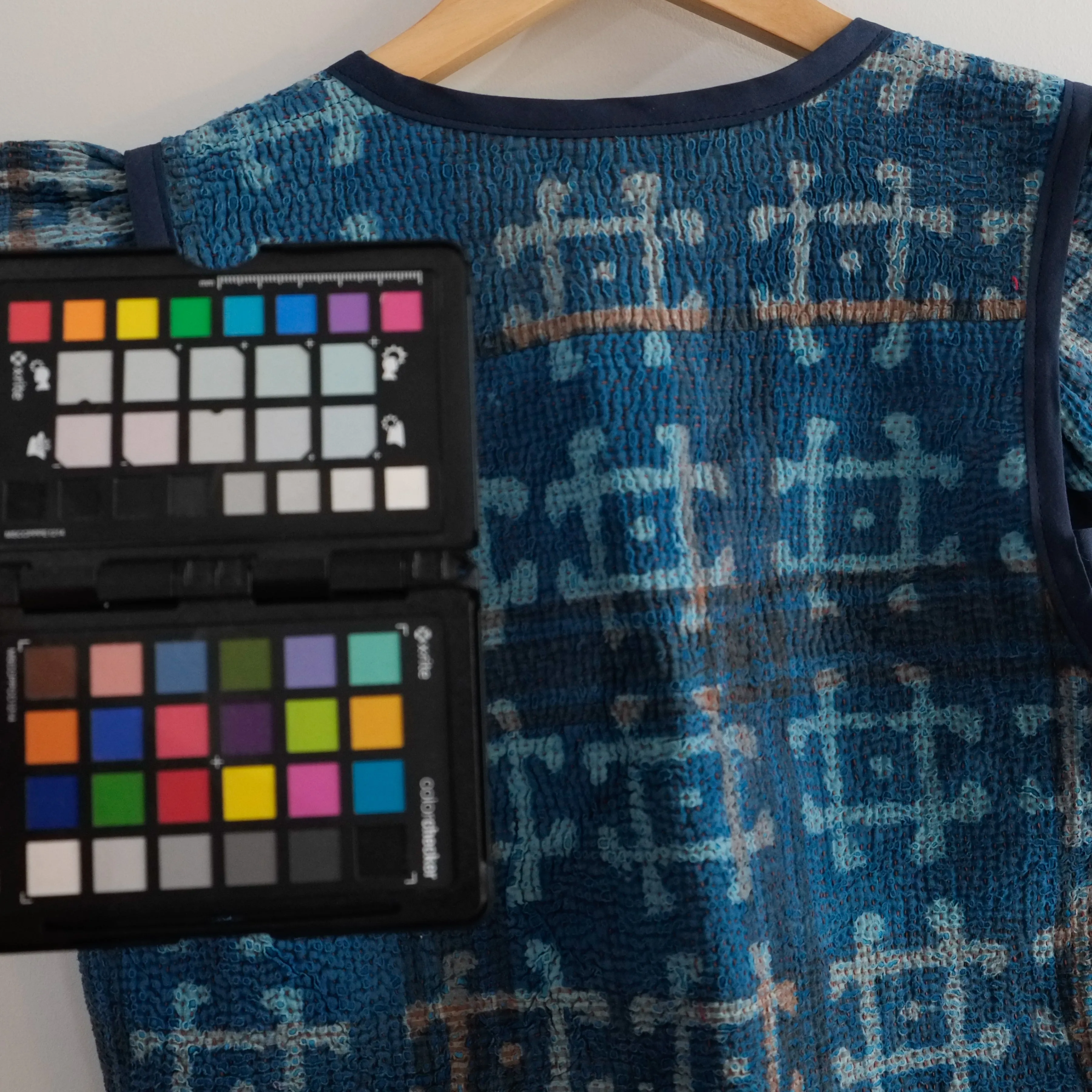 Amelia Flutter Sleeve Vest Indigo with Pound Symbol XS009