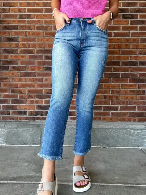 Risen Mid Rise Raw Hem Straight Leg Jean
