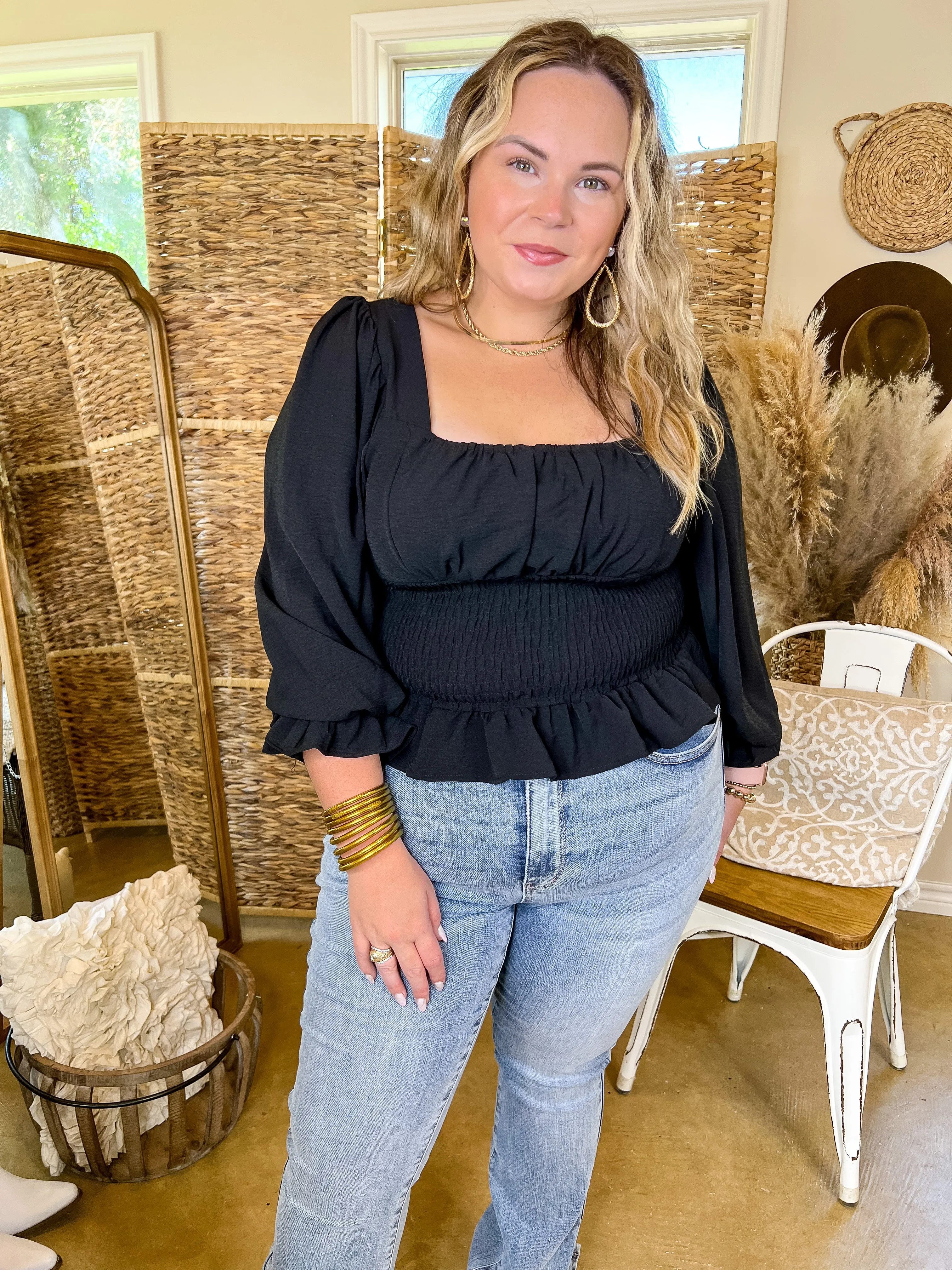 Starting Fresh Long Sleeve Peplum Top with Smocked Bodice in Black